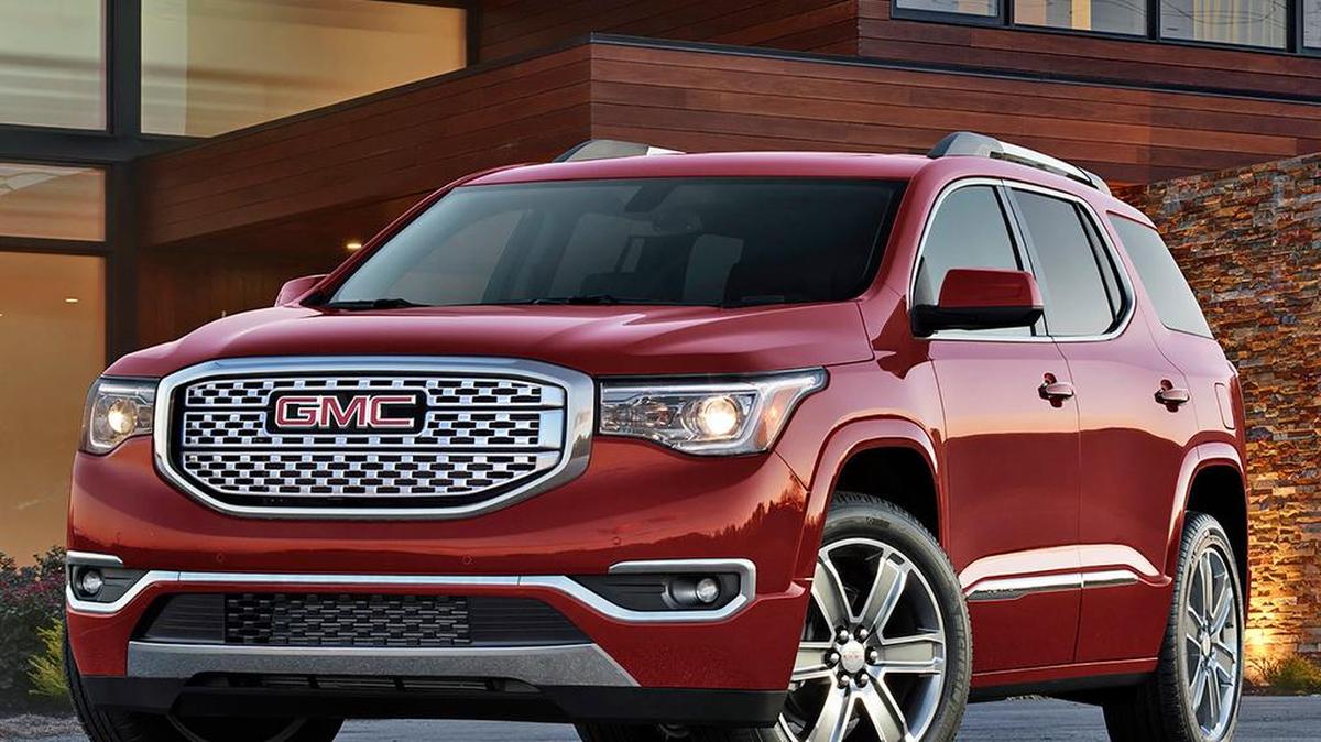 The Denali model, shown here in crimson red tintcoat, is the top of the line for the resdesigned 2017 GMC Denali midsize crossover. It a V-6 engine and six-speed automatic transmission, and room for up to seven people.