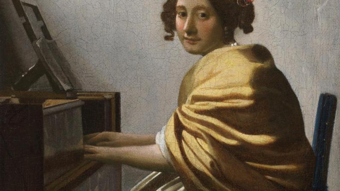 Young Woman Seated at a Virginal, by Johannes Vermeer, c. 1670-72, oil on canvas