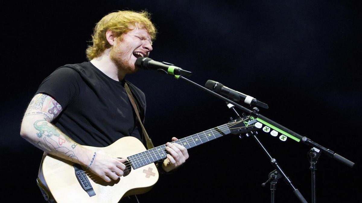 Ed Sheeran, seen her performing to a sold out Verizon Theatre in 2015, played American Airlines Center Friday night and put on a Dallas Mavericks jersey during the concert.