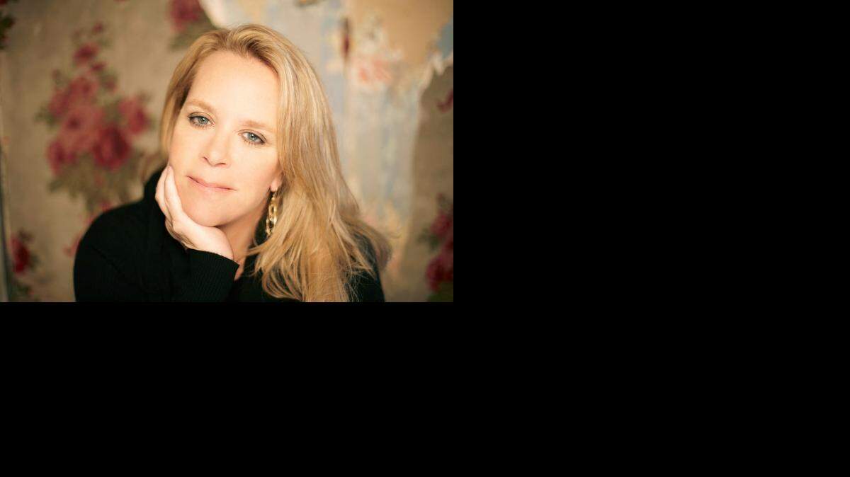 Mary Chapin Carpenter is a five-time Grammy Award winner.<252><137>. Credit: Photo by Russ Harrington <137><137><252><137>