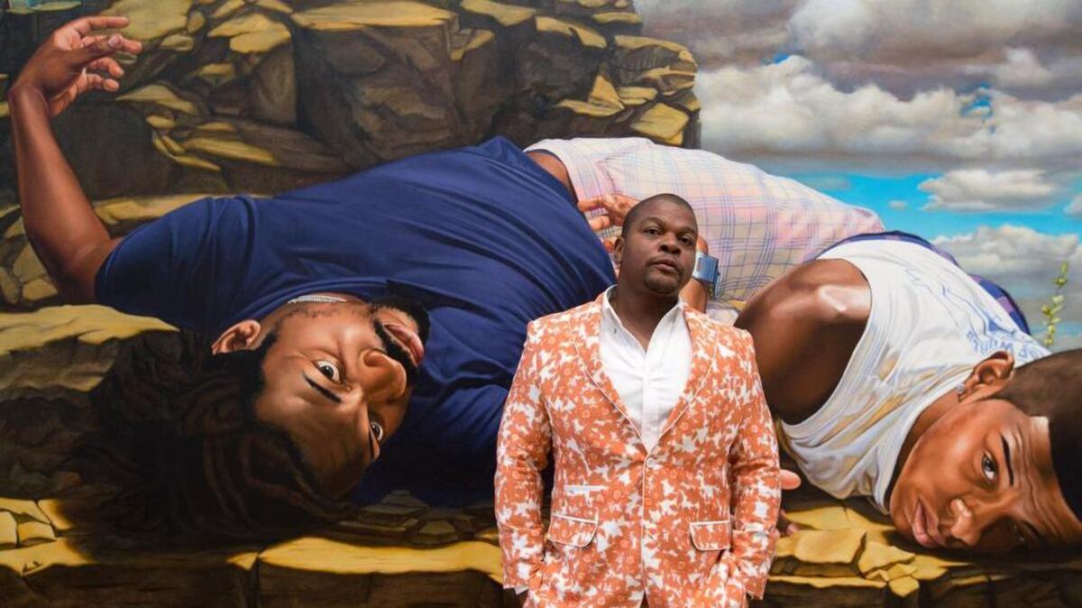
Artist Kehinde Wiley stands in front of Santos Dumont — The Father of Aviation II, 2009. 


