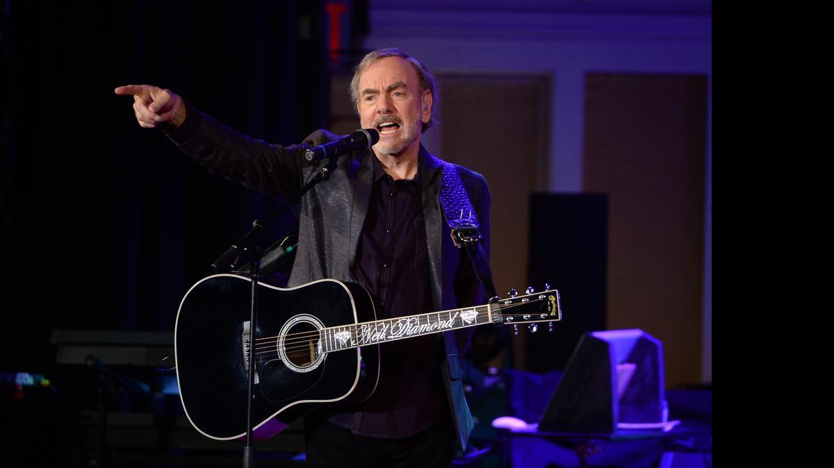 
Singer-songwriter Neil Diamond performs at his former high school, Erasmus Hall High School, for his first-ever performance in his hometown in the Brooklyn borough of New York on Sept. 29, 2014.
