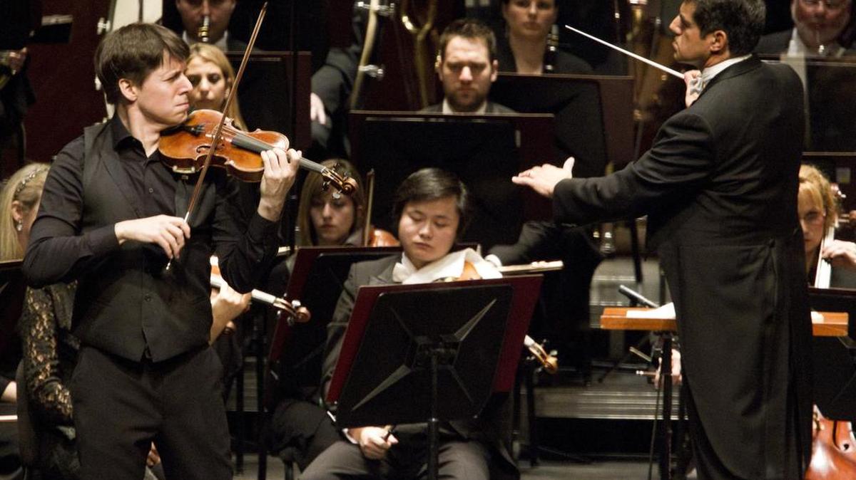Violinist Joshua Bell performs with the Fort Worth Symphony Orchestra during their annual gala performance.