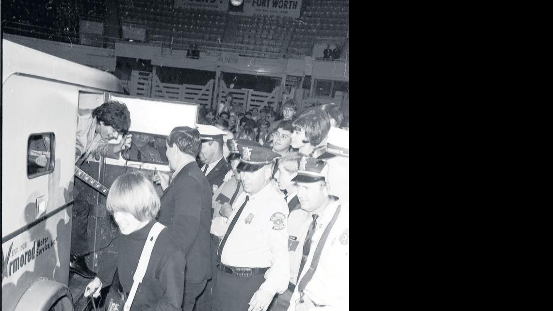 
The Rolling Stones arrive for their 1965 concert at Will Rogers Coliseum in an armored car.


