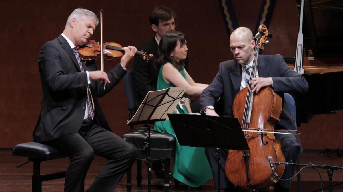 Stephen Rose, Rieko Aizawa and Brant Taylor, from left, and Jesse Mills (in background) were some of the performers on the opening night of the Mimir festival.