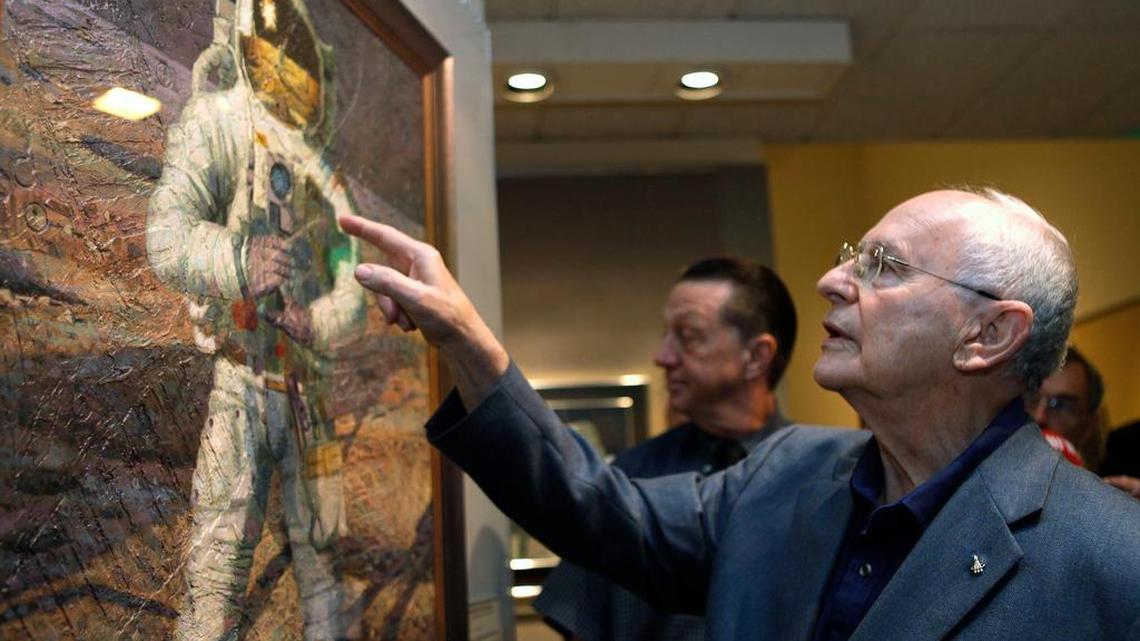 Bean’s paintings reflect his time in space. He was the lunar module pilot for Apollo 12 and walked on the moon.