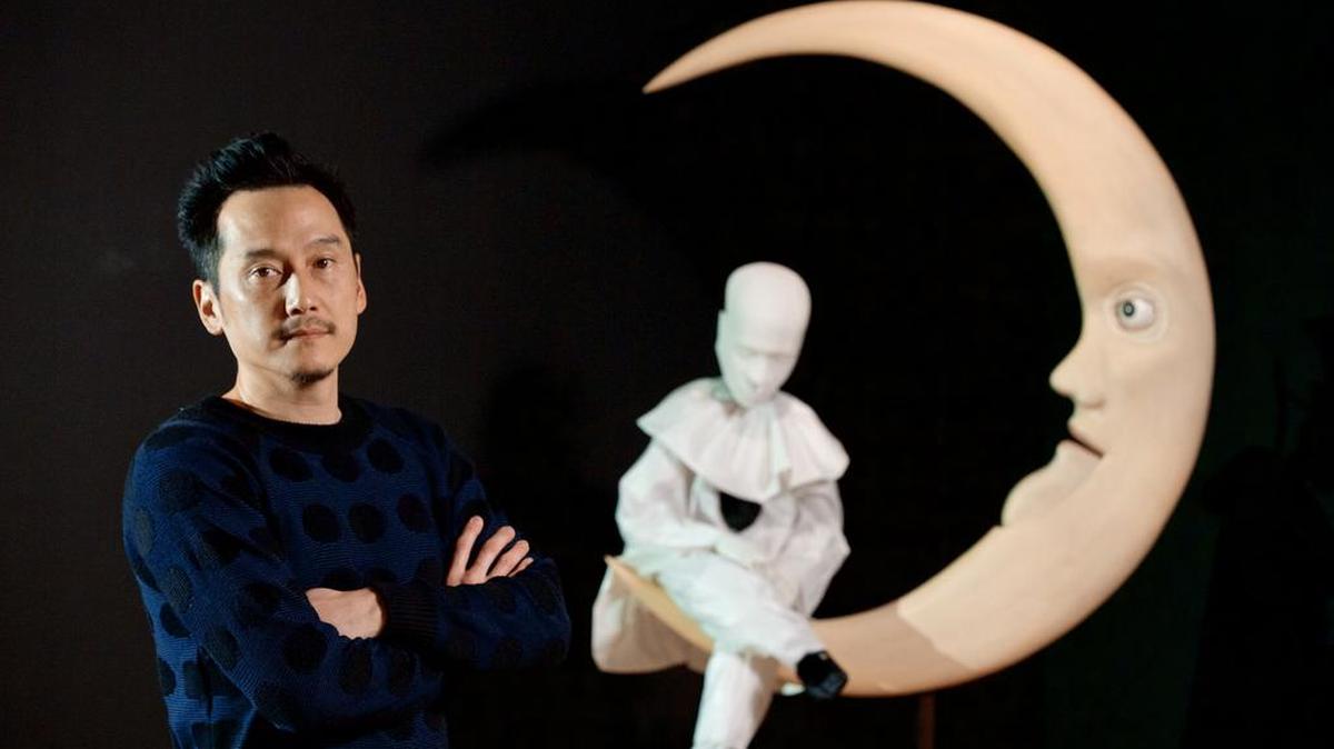 Glenn Kaino in front of his “L'enetenafionale, 2015” (Wood, aluminum, brass, depth camera, electronics, starch, and French moon accent) at the Modern Art Museum of Fort Worth