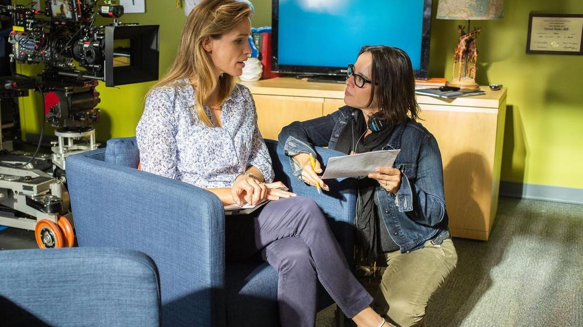 Director Patricia Riggen, right, talks with Jennifer Garner on the set of Miracles From Heaven.