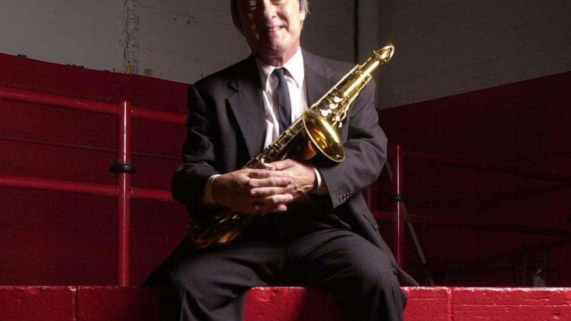 Larry Roquemore, previously the leader of the garage rock band Larry and the Blue Notes, sits on the original stage of the Holiday Skating Rink in Haltom City in 2004, where they had performed in the 1960’s.