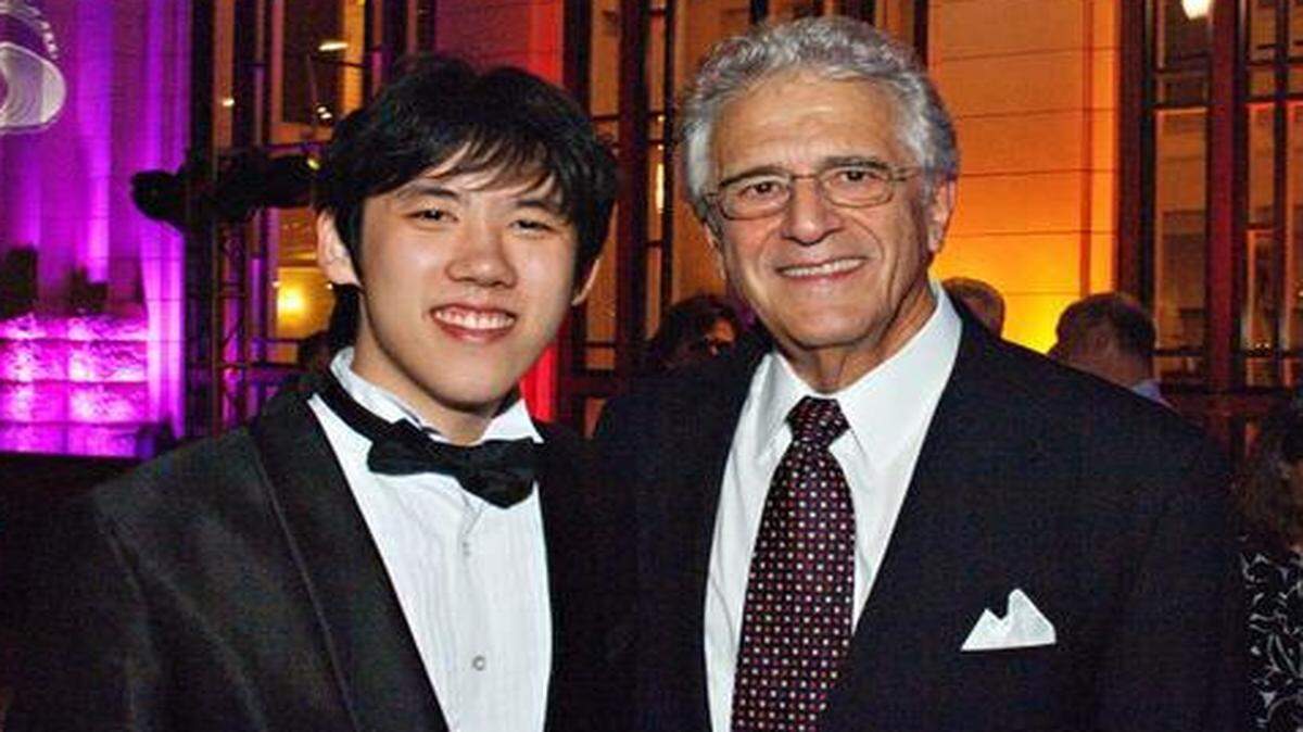 
Haochen Zhang, 2009 gold medalist, and John Giordano during a street party outside Bass Hall to celebrate the Cliburn’s 50th anniversary in September 2012.
