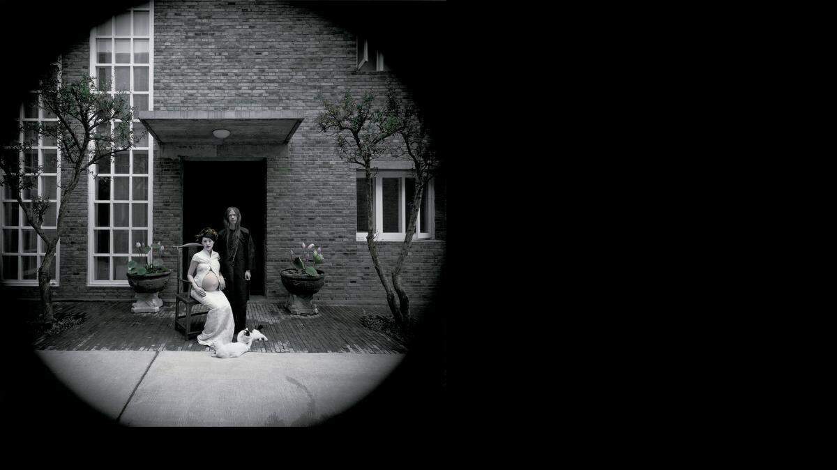 <italic>Caochangdi, Beijing, 2004 No. 1</italic> is as much a portrait of the coming baby as of the couple.<252><137>by RongRong&inri, hand-dyed on gelatin silver print<252><137>