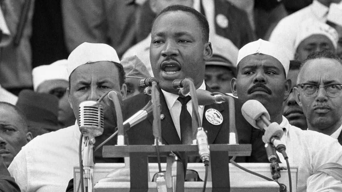 FILE- In this Aug. 28, 1963, black-and-white file photo Dr. Martin Luther King Jr., head of the Southern Christian Leadership Conference, addresses marchers during his "I Have a Dream" speech at the Lincoln Memorial in Washington. NBC News says it will rebroadcast a 1963 "Meet the Press" interview with Martin Luther King Jr. in honor of the March on Washington's 50th anniversary next week. King appeared on the news program three days before his landmark “I Have a Dream” speech at the civil rights march. (AP Photo/File)