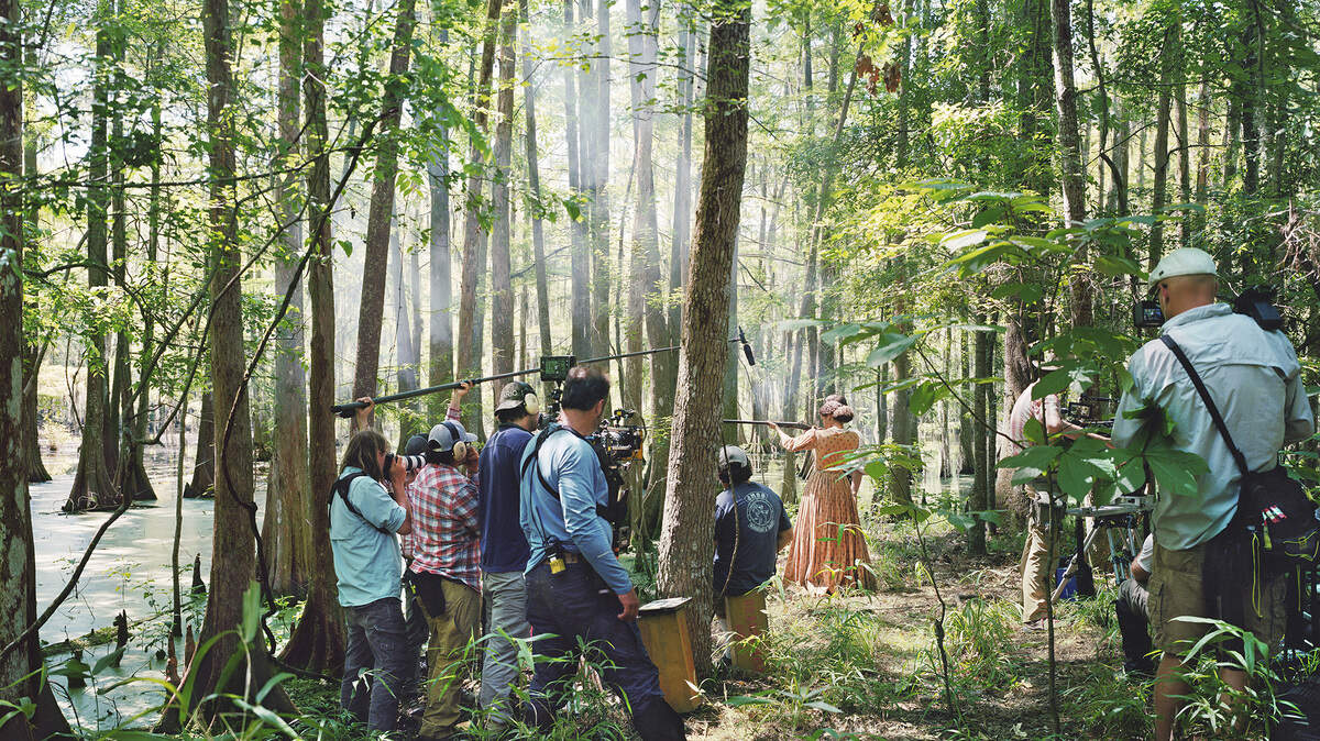 An-My Lê (b. 1960), Fragment VII: Film Set (Free State of Jones), Firing Lesson, Chicot State Park, Louisiana, 2016, inkjet print.
