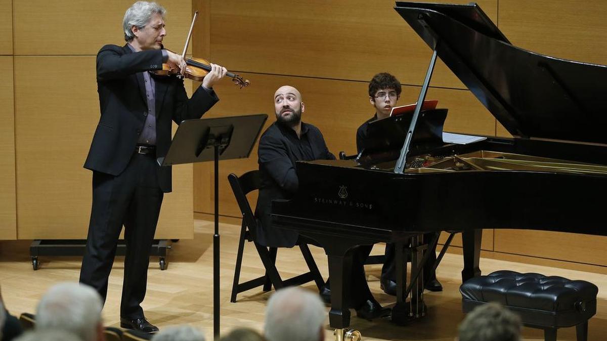 Pianist Alessandro Deljavan is accompanied by Gary Levinson on violin at the Modern Art Museum of Fort Worth Saturday, Nov. 15, 2014. (Star-Telegram/Ron T. Ennis)