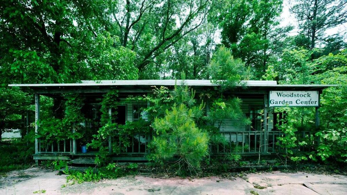 This photo taken May 3, shows the remains of a business in Woodstock, Ala., once operated with the help of John B. McLemore, who is featured in the serialized podcast “S-Town.”