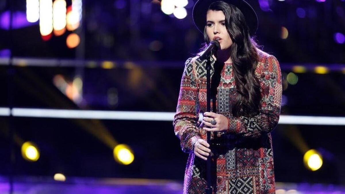 Madi Davis performs during the “knockout rounds” on “The Voice.”