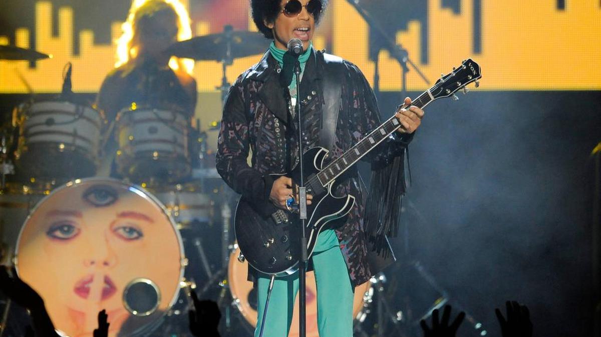In this May 19, 2013 file photo, Prince performs at the Billboard Music Awards at the MGM Grand Garden Arena in Las Vegas.