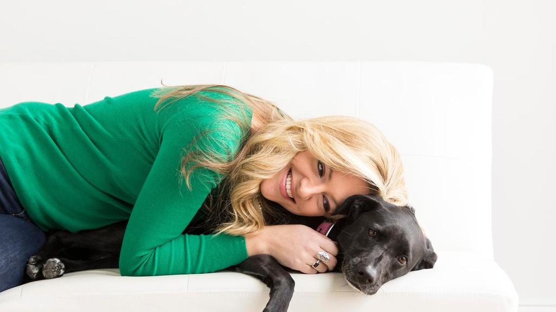 WFAA/Channel 8 meteorologist Colleen Coyle with her dog, Luna. Coyle will be the master of ceremonies for Artist for Animals’ 2017 Concert for Kindness.