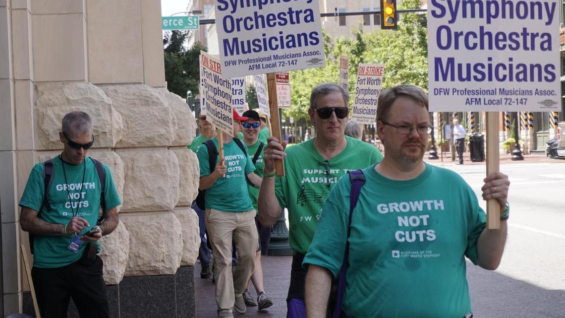 Fort Worth Symphony musicians walk the picket line in front of Bass Hall after calling a strike Thursday.