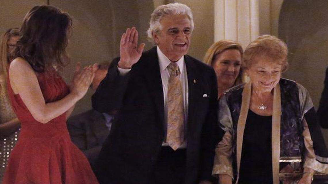 
John Giordano acknowledges applause with his wife, Mary Alice, right, before the tribute concert Tuesday night, April 7, 2015. 



