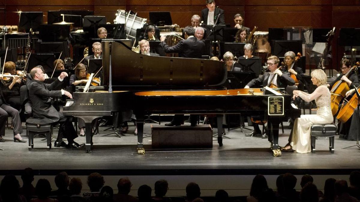 Louis Lortie, left and Helene Mercier perform with the Fort Worth Symphony Orchestra at Bass Hall on September 11.