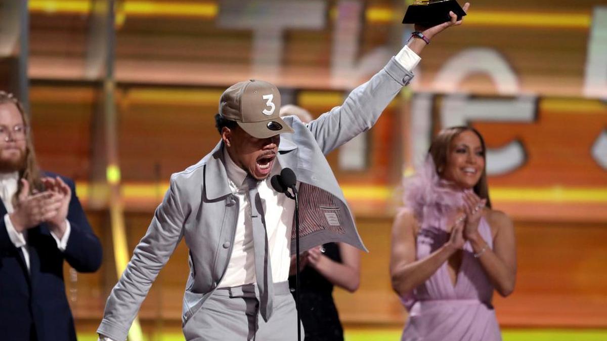 Chance the Rapper accepts the award for best new artist Sunday at the 59th Annual Grammy Awards in Los Angeles.