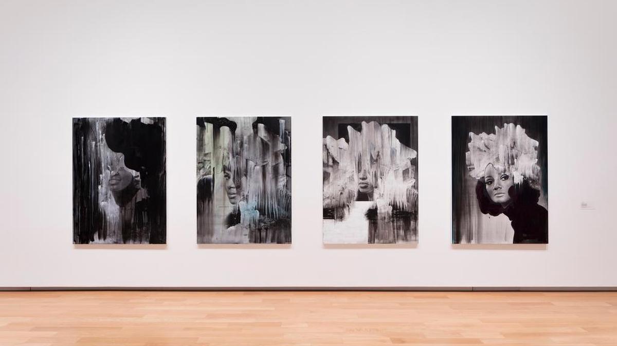 The works of Lorna Simpson hang in a gallery at The Modern.