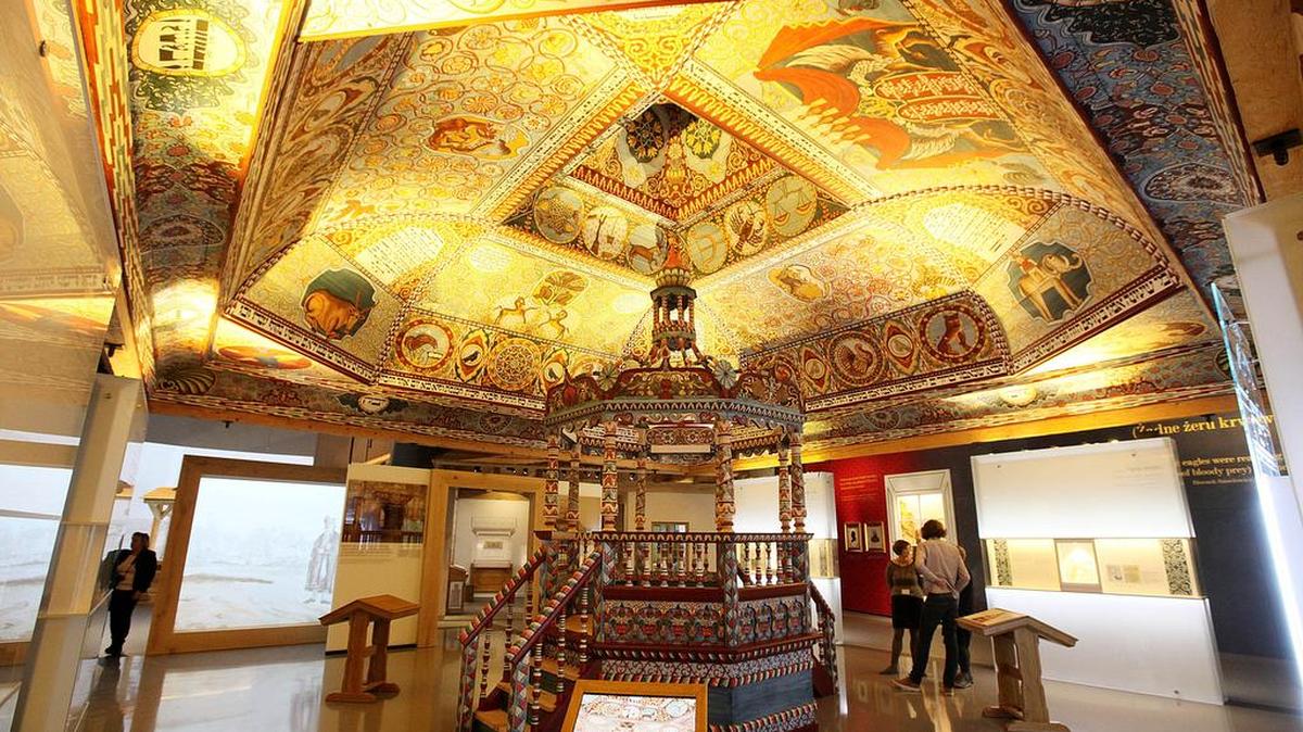 This Oct. 21, 2014 file photo shows the reconstruction of a wooden 17th-century synagogue once located in Gwozdziec, a formerly Polish town now in Ukraine, at the POLIN Museum of the History of Polish Jew in Warsaw, Poland. This museum is opening an exhibition of abstract works by American artist Frank Stella that were inspired by similar wooden synagogues. "Frank Stella and the Synagogues of Historic Poland" opens Friday and will run through June 20.