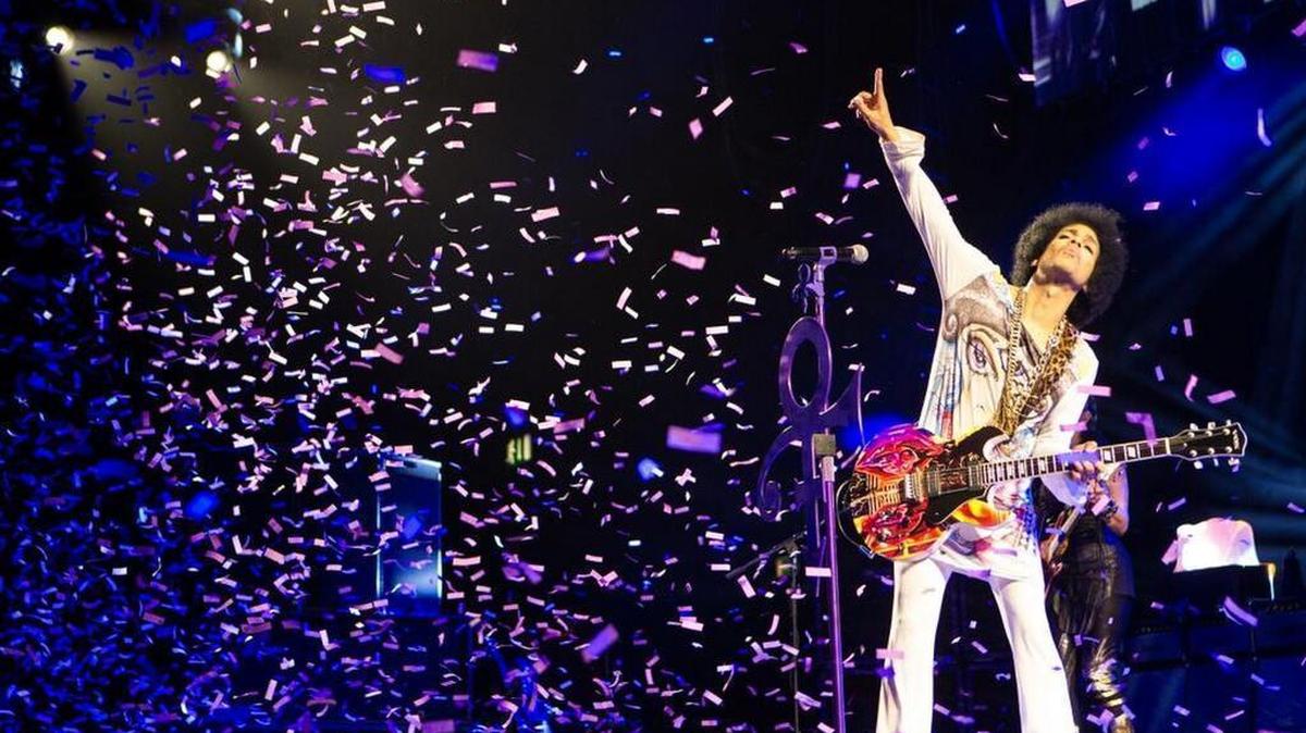 Prince performs in Birmingham, England, Sept. 30, 2014.
