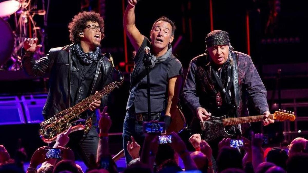 Bruce Springsteen, center, performs at American Airlines Center in Dallas in April.
