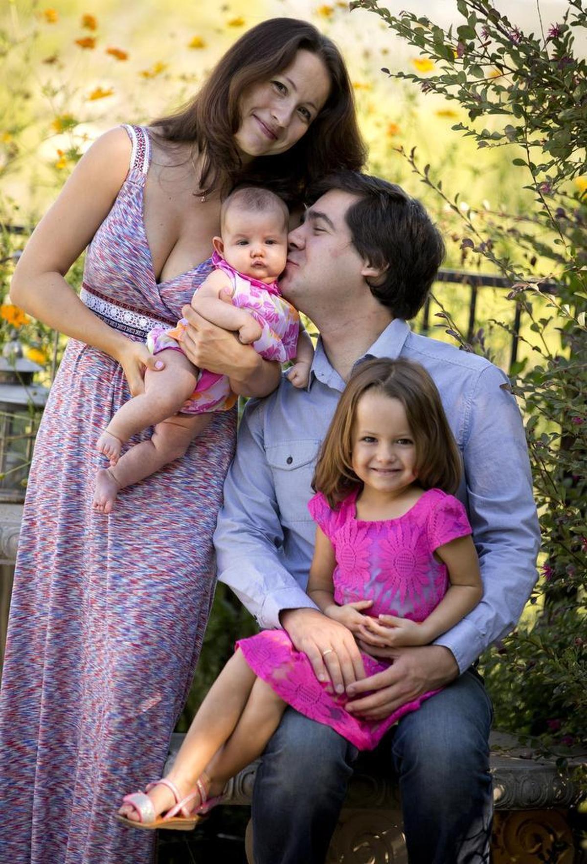 Kholodenko with his wife, Sofya Tsygankova, and daughters Nika, then 4, and Michaela, 2 months old, in September 2014.