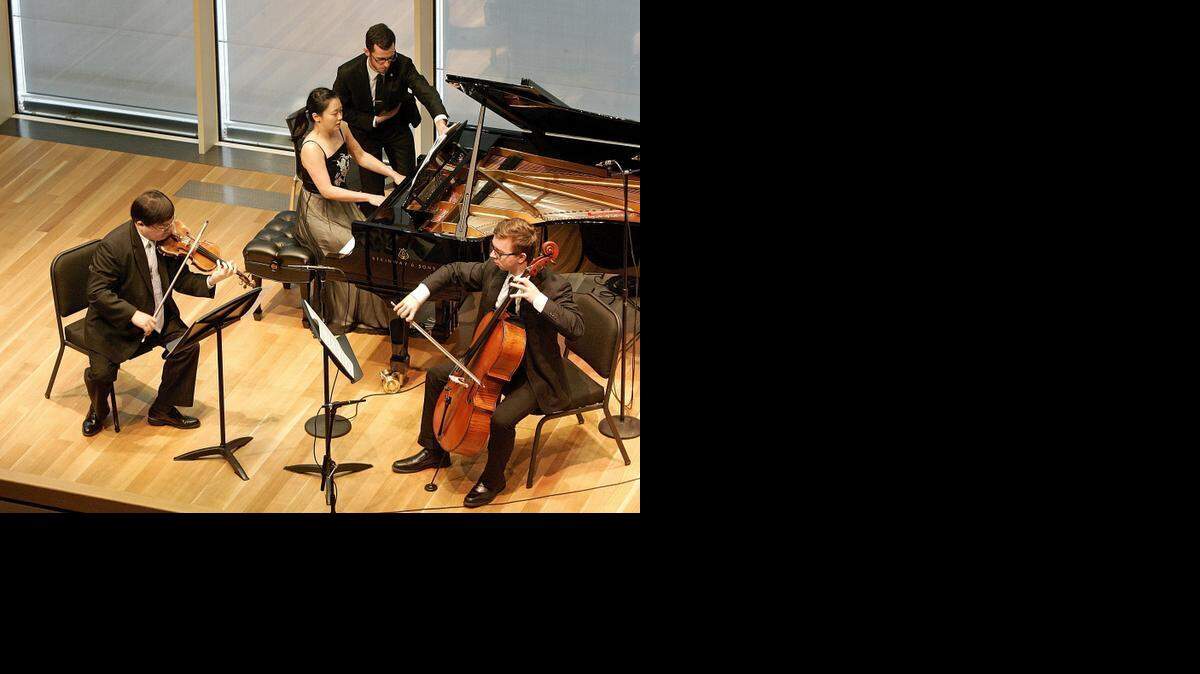 
Michael Shih, Fei-Fei Dong and Allan Steele play Chopin's Trio for a Piano, Violin and Cello in G minor, op. 8 in the Kimbell Piano Pavillion.
