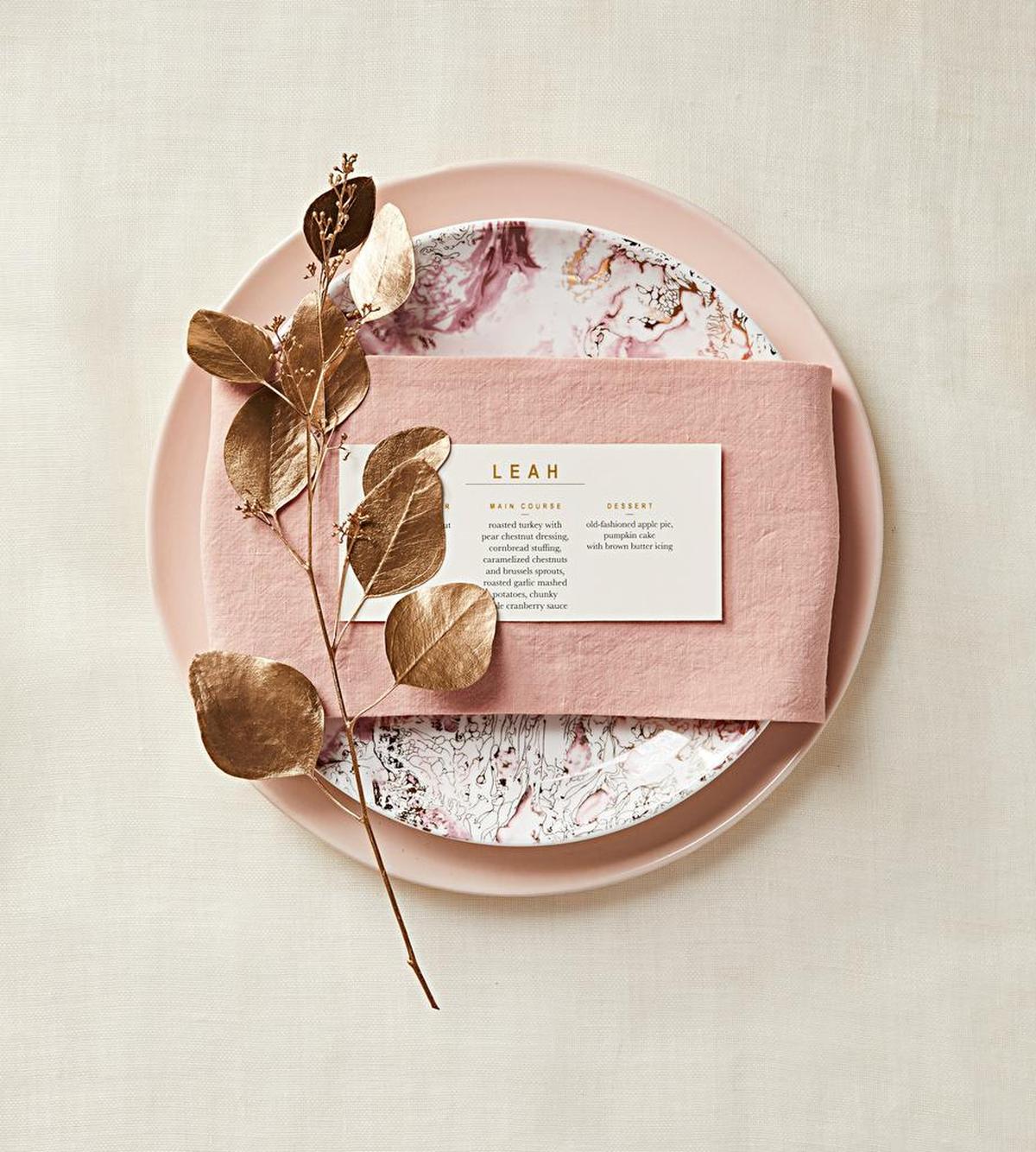 Taking a moment to fold napkins beautifully adds an elegance to any holiday table. Wrap It Around.