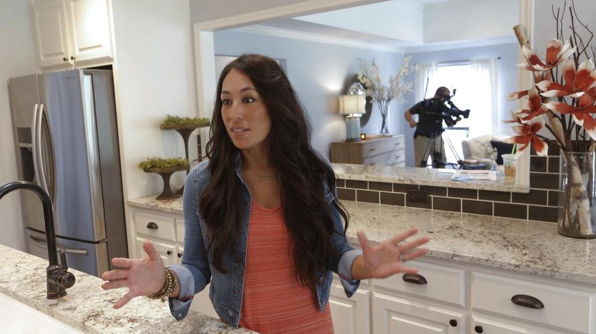 Joanna Gaines talks during filming during the second season of “Fixer Upper.”