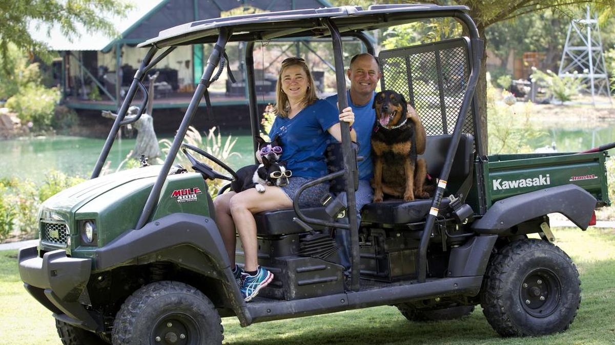 
Cricket, Scooter, and Blue join Noelle Bleuler and Robert Hafkesbring in their Mansfield garden.
