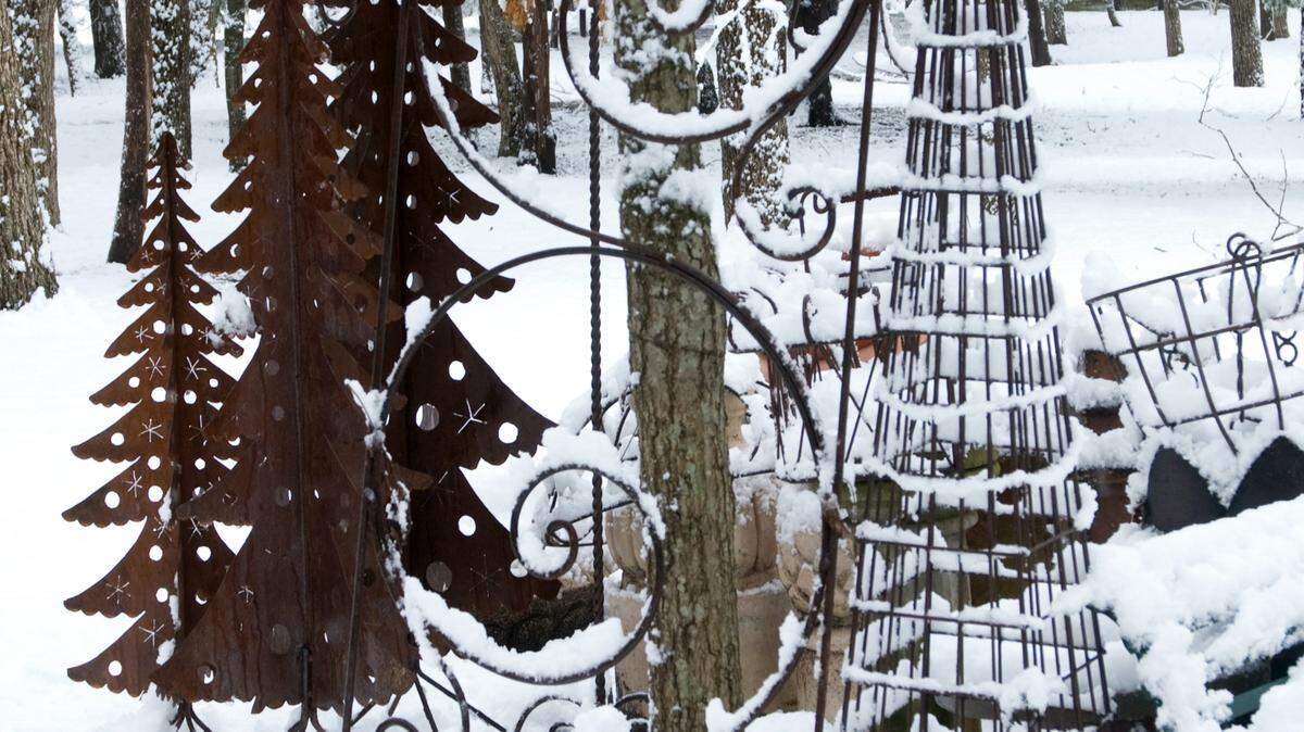 Rusty garden art got caught by early snow several years back in the Sperry landscape.