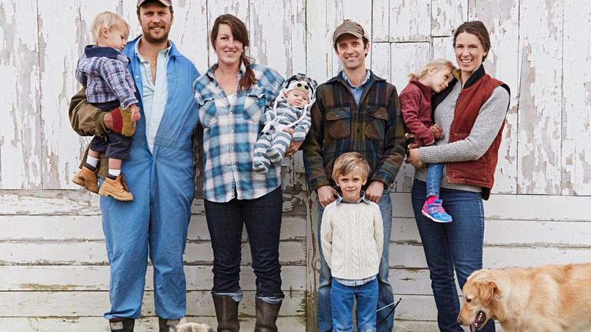 The Uplands Cheese family includes, from left, Scott and Liana Mericka and their sons, Everett and Henry; Andy and Caitlin Hatch with their son, Augie, and daughter, Gillie; and dogs Clover and Marshall.