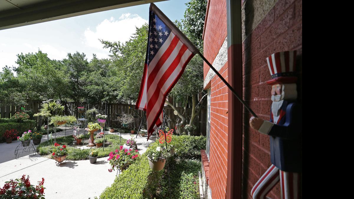 
Behind Building 12 at The Courtyards at River Park in Fort Worth, resident Pat Kemp has cultivated a small garden that her neighbors enjoy, earning the nickname, “the flower lady.”


