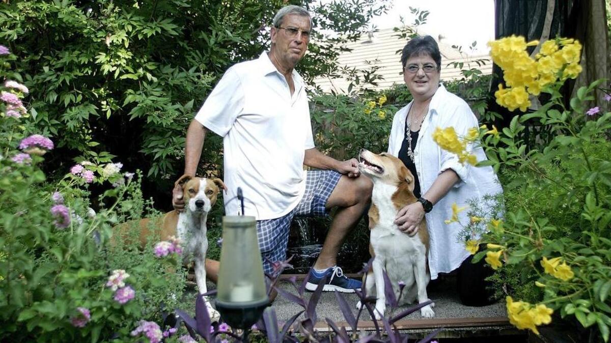 
Tom Donaldson, Kathy Phelps and their two rescue dogs, Cyrus and Ozzie, spend a lot of time in their Arlington garden. Donaldson builds all of the structures and Phelps plants and takes care of the gardens. 
