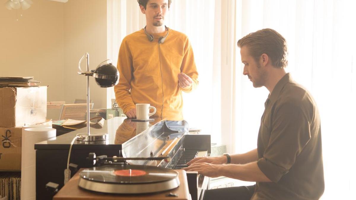 Ryan Gosling, right, did much of his own piano playing on ‘La La Land.’ Here, he works with director Damien Chazelle.