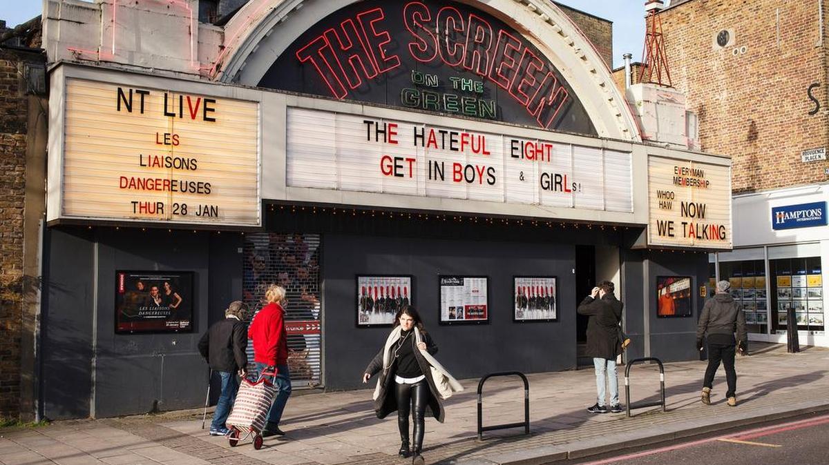Locals walk past the Screen on the Green cinema in London. With a fabulous neon facade, it hosts movies and live events. It’s one of the oldest cinemas in the UK. The Clash, Sex Pistols and Buzzcocks played together there on the night Aug. 29, 1976. It was the end of the long, hot summer when punk was born.