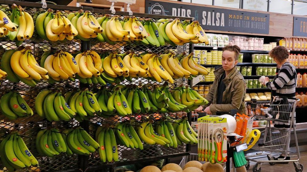 Customers shop at a Whole Foods Market in Upper Saint Clair, Pa.