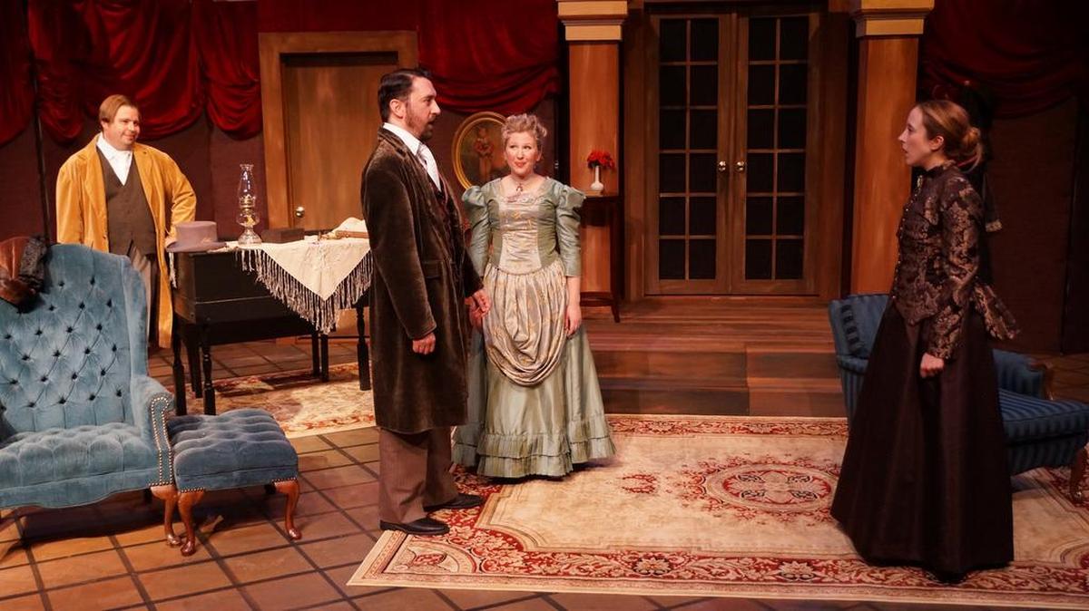 Michael Johnson (Dr. Rank), Richard Stubblefield (Torvald), Lauren Morgan (Nora), and Julie Rhodes (Mrs. Linde) in ‘A Doll’s House’