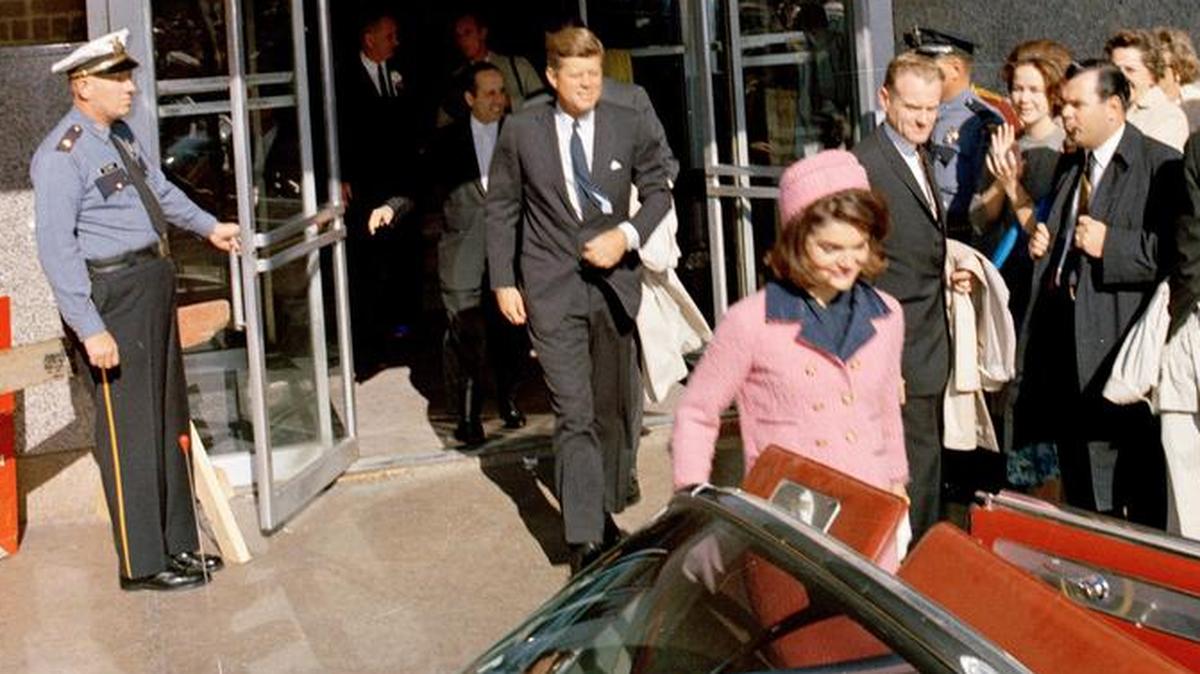 President John F. Kennedy and his wife, Jacqueline, depart the Hotel Texas for a motorcade through Fort Worth to Carswell Air Force Base, from which they would fly to Dallas Love Field.