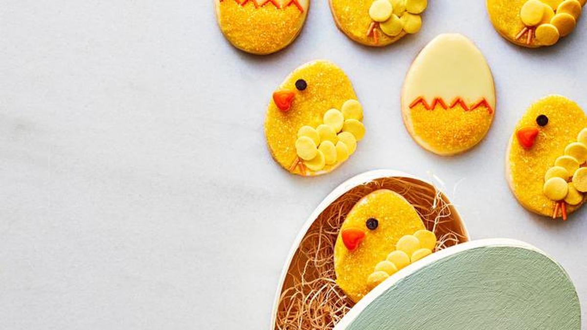 Stick on candy details before the icing dries on these lemon shortbread cookies, which are sure to delight everyone, especially children.