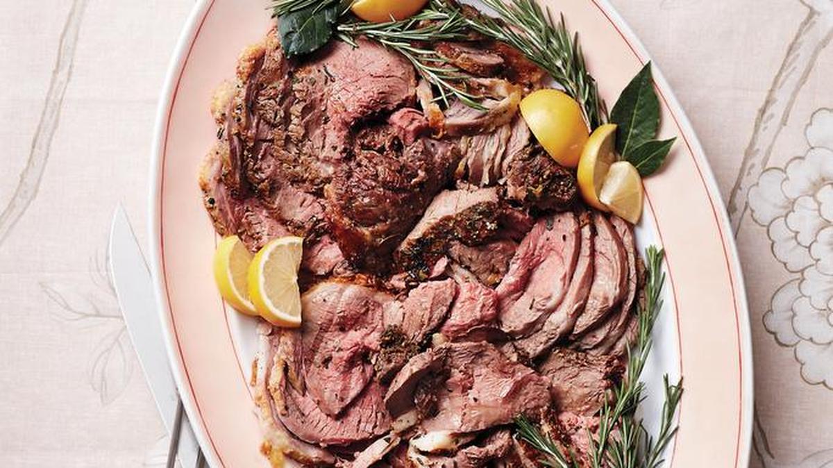 Welcome guests — and the spring season — by serving a platter with slices of salt-crusted leg of lamb