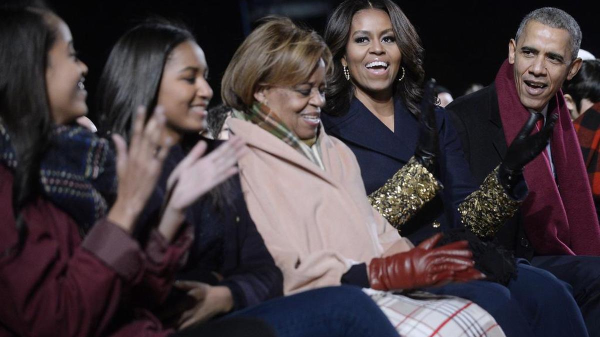 President Barack Obama, first lady Michelle Obama, daughters Malia and Sasha and Michelle Obama’s mother, Marian Robinson, attend a Christmas tree lighting in 2015.
