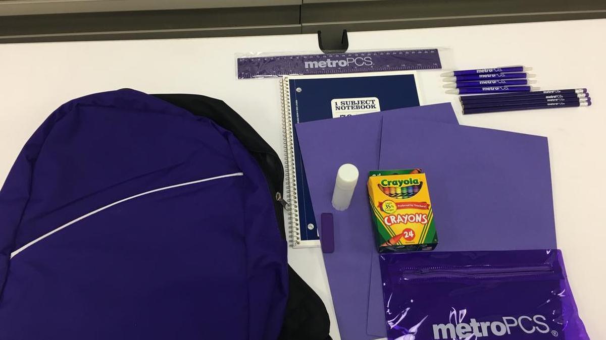 The MetroPCS giveaway includes a backpack, pencils, pens, a pencil bag, a standard ruler, glue stick, eraser, folder, crayons and a spiral notebook. No purchase is required.