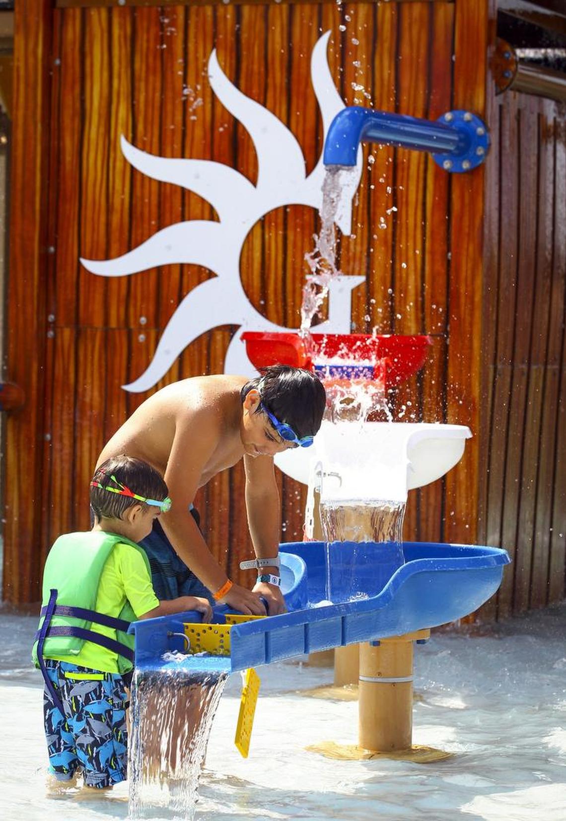 Guests enjoy the water features at the new addition to the Paradise Springs water park at the Gaylord Texan.
