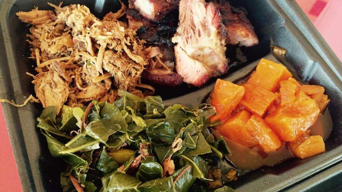 
Collards, yams, pulled pork and rib ends at Rosako’s in Bedford.
